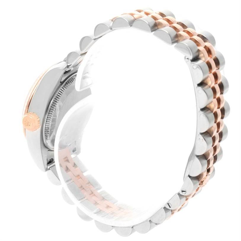This is a side view of the Rolex Datejust 179171 Women
s Steel and Gold (two tone) Silver Dial 179171 Women
s Steel and Gold (two tone) Silver Dial model, showing its crown, case side, and two-tone Jubilee bracelet.
