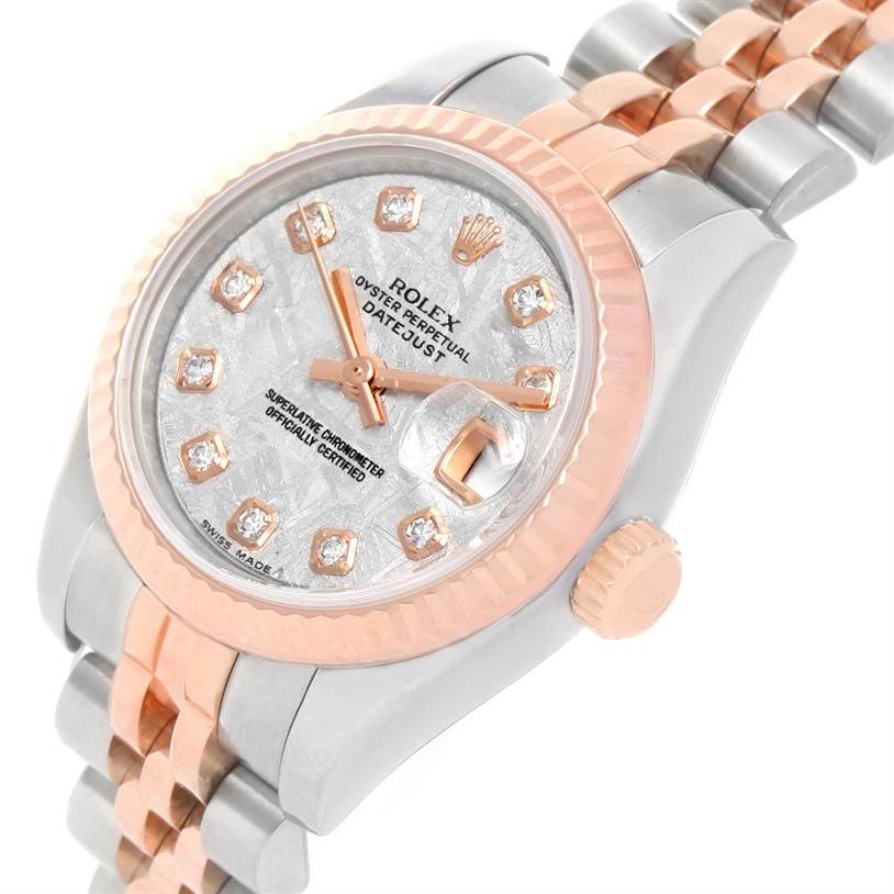 This image shows a close-up, angled view of a Rolex Datejust 179171 Women
s Steel and Gold (two tone) Silver Dial 179171 Women
s Steel and Gold (two tone) Silver Dial watch
s face, bezel, and part of the bracelet.