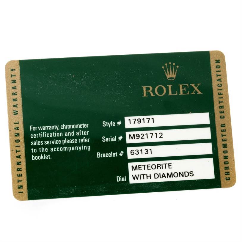 This image shows the warranty card with details of the Rolex Datejust 179171 Women
s Steel and Gold (two tone) Silver Dial 179171 Women
s Steel and Gold (two tone) Silver Dial model, including the style, serial, and bracelet numbers, and dial description.