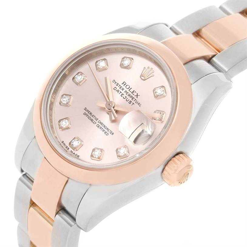 The image shows a close-up of the Rolex Datejust 179161PDO Women's Steel and Gold (two tone) Pink Dial 179161PDO Women's Steel and Gold (two tone) Pink Dial watch displaying the face, bezel, crown, and part of the bracelet.