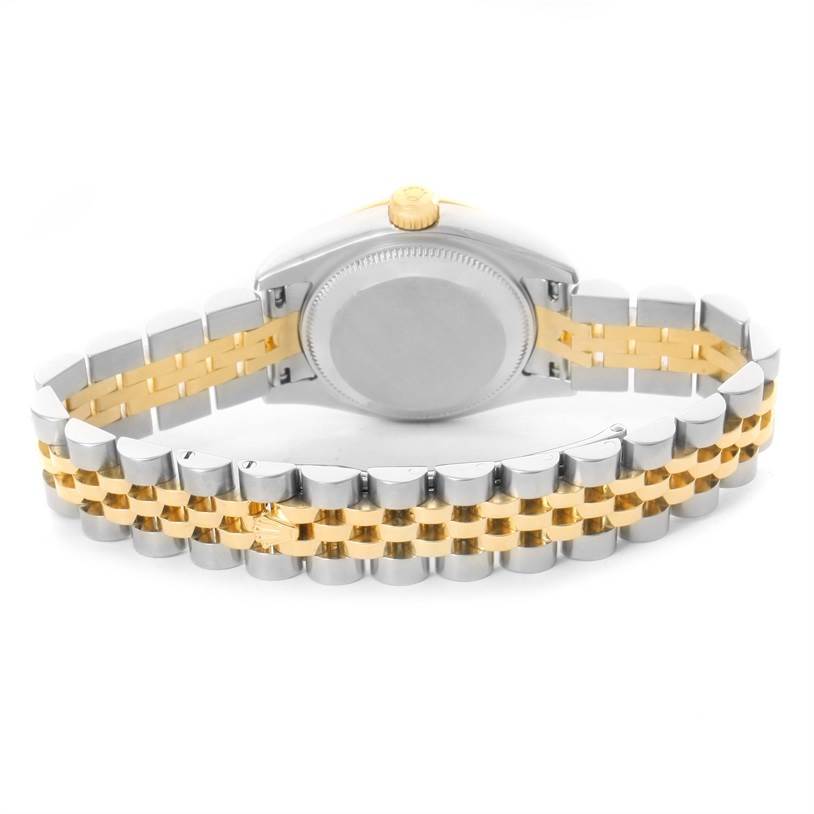 This image shows the back and bracelet of a Rolex Datejust 179173 Women's Steel and Gold (two tone) Black Dial 179173 Women's Steel and Gold (two tone) Black Dial watch, highlighting its two-tone metal design.