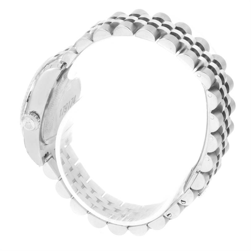 This image shows the side view of a Rolex Datejust 179174 Women's Stainless Steel White Dial 179174 Women's Stainless Steel White Dial watch, focusing on the Jubilee bracelet and crown.