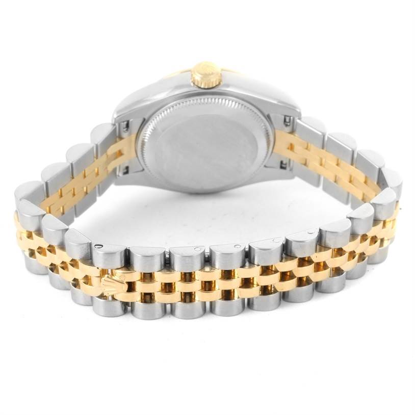 This image shows the back and bracelet of a Rolex Datejust 179173 Women's Steel and Gold (two tone) Black Dial 179173 Women's Steel and Gold (two tone) Black Dial watch with a two-tone gold and stainless steel design.