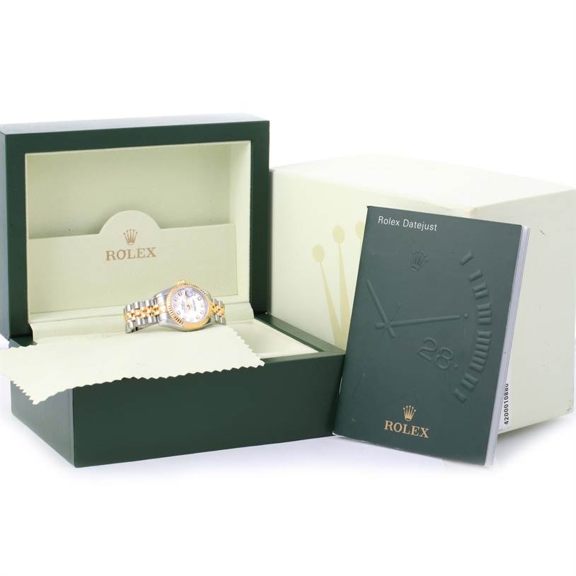 The image shows a Rolex Datejust 179173 Women's Steel and Gold (two tone) Black Dial 179173 Women's Steel and Gold (two tone) Black Dial watch inside its open box, accompanied by a booklet.