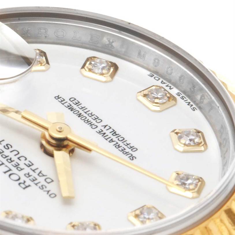 The close-up angle shows the dial, hands, diamond hour markers, and part of the bezel of the Rolex Datejust 179173 Women's Steel and Gold (two tone) Black Dial 179173 Women's Steel and Gold (two tone) Black Dial watch.