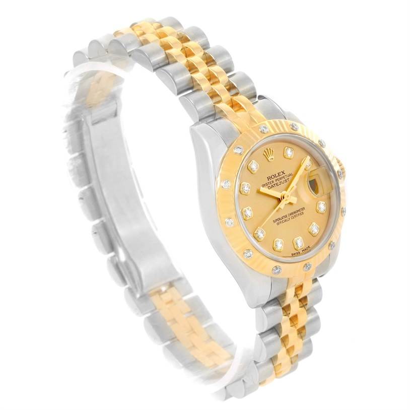 This Rolex Datejust 179313 Women
s Stainless Steel Champagne Dial 179313 Women
s Stainless Steel Champagne Dial watch is shown at an angled front view, highlighting its two-tone bracelet and diamond-studded dial.