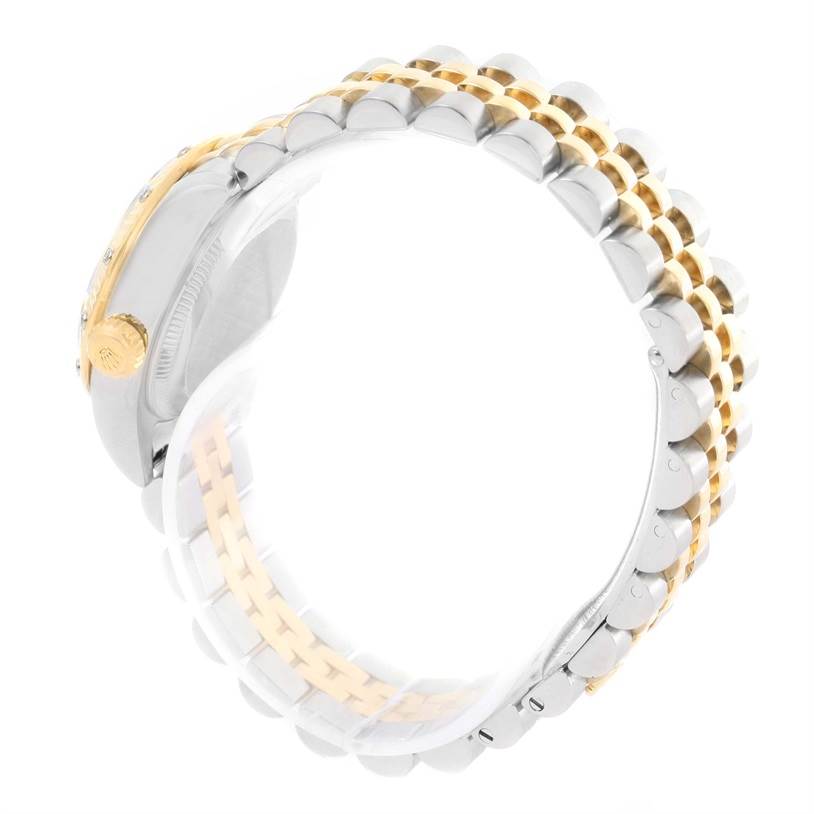 The image shows the side view and partial bracelet of a Rolex Datejust 179313 Women
s Stainless Steel Champagne Dial 179313 Women
s Stainless Steel Champagne Dial watch, highlighting its two-tone metal design.