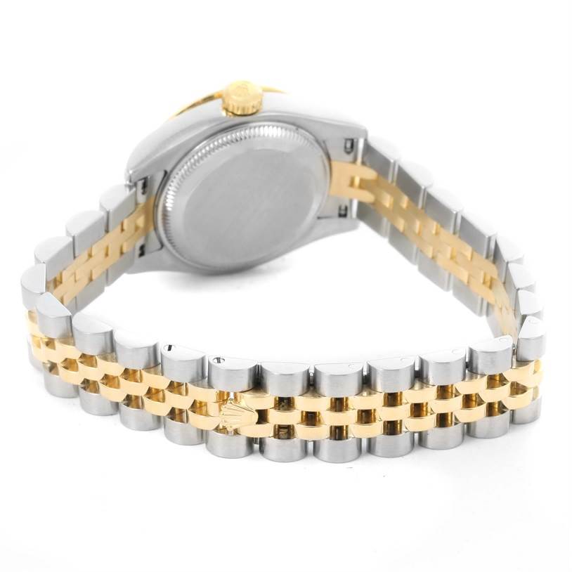 This image shows the back case and two-tone bracelet of a Rolex Datejust 179313 Women
s Stainless Steel Champagne Dial 179313 Women
s Stainless Steel Champagne Dial watch from a rear angle.