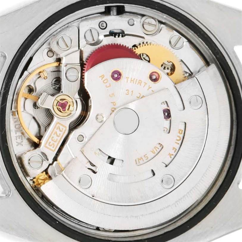 This image shows the inner mechanism and movement of a Rolex Datejust 179160 Women
s Stainless Steel Black Dial 179160 Women
s Stainless Steel Black Dial watch from a back angle.