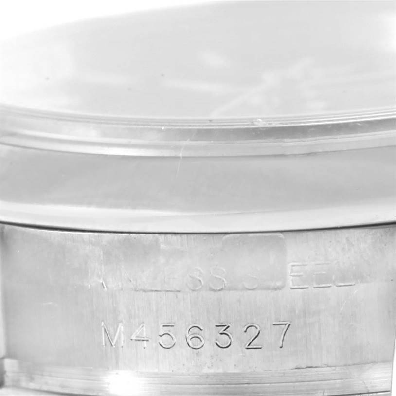 The image shows a close-up of the case side with the serial number of a Rolex Datejust 179160 Women
s Stainless Steel Black Dial 179160 Women
s Stainless Steel Black Dial watch.