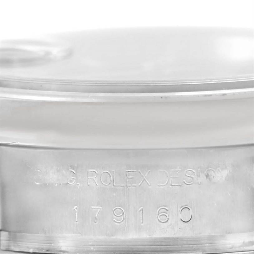 This image shows the side of the Rolex Datejust 179160 Women
s Stainless Steel Black Dial 179160 Women
s Stainless Steel Black Dial watch with the model number 179160 engraved.