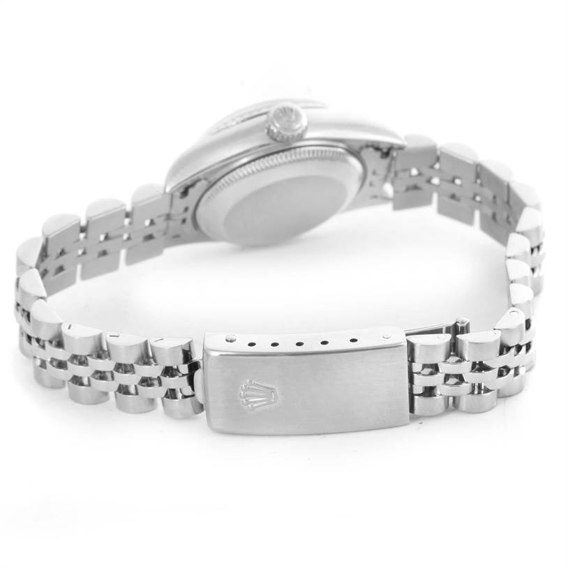 The image shows the back of a Rolex Datejust 79174 Women
s Stainless Steel Silver Dial 79174 Women
s Stainless Steel Silver Dial watch, highlighting the clasp and part of the bracelet.