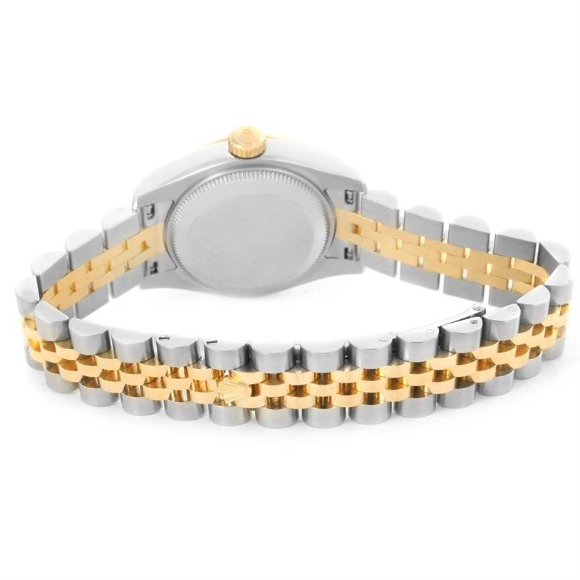 The image shows the back case and bracelet of a Rolex Datejust 179173 Women's Steel and Gold (two tone) White Dial 179173 Women's Steel and Gold (two tone) White Dial watch, including the clasp and crown.