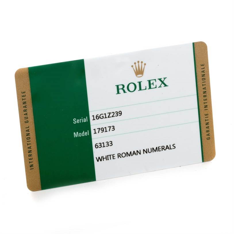The image shows the warranty card for a Rolex Datejust 179173 Women's Steel and Gold (two tone) White Dial 179173 Women's Steel and Gold (two tone) White Dial model, detailing serial and model numbers.