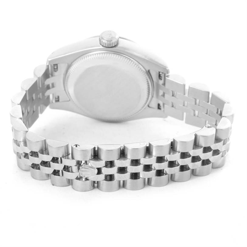 The image shows the back case and bracelet of a Rolex Datejust 179174 Women
s Stainless Steel Mother of Pearl Dial 179174 Women
s Stainless Steel Mother of Pearl Dial watch from a rear angle.