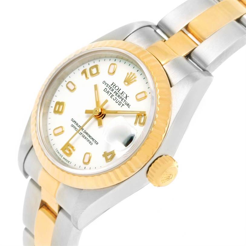 This Rolex Datejust 79173 Women
s Stainless Steel White Dial 79173 Women
s Stainless Steel White Dial is shown at an angled close-up, highlighting the dial, crown, bezel, and part of the bracelet.
