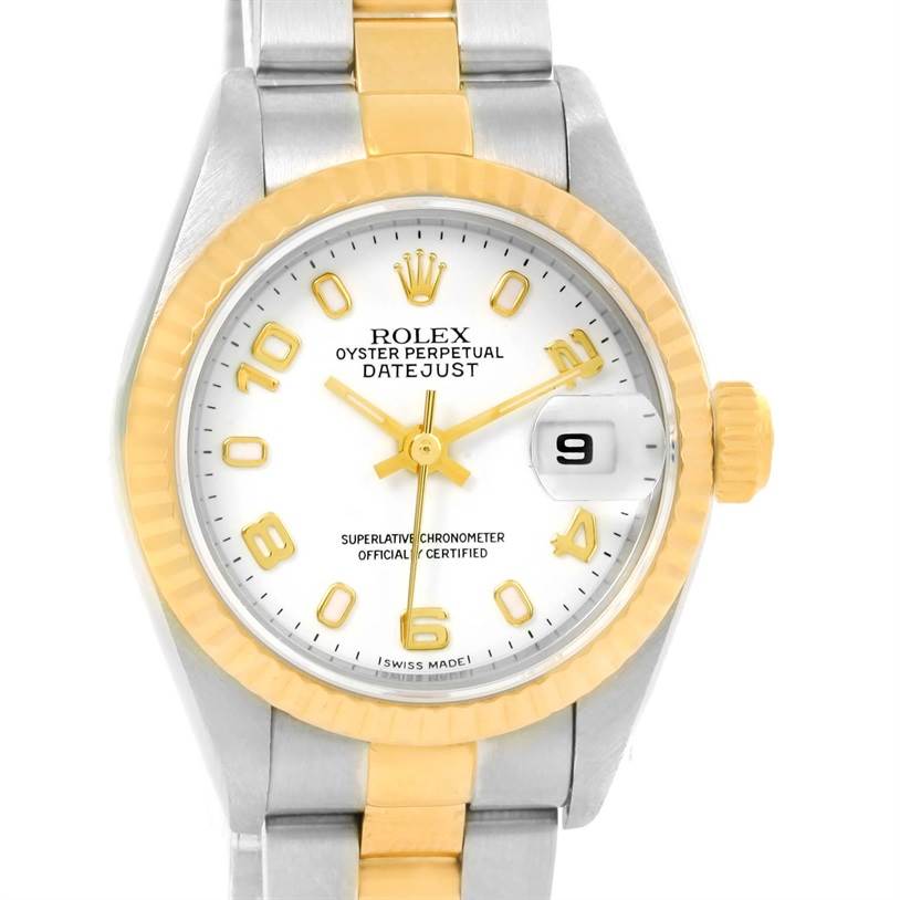 This Rolex Datejust 79173 Women
s Stainless Steel White Dial 79173 Women
s Stainless Steel White Dial watch is displayed from a front angle, showcasing the dial, bezel, and part of the bracelet.