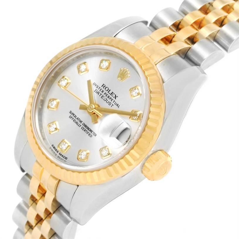 The image shows a close-up, angled view of a Rolex Datejust 179173 Women's Steel and Gold (two tone) Silver Dial 179173 Women's Steel and Gold (two tone) Silver Dial watch, emphasizing the dial, bezel, crown, and part of the band.