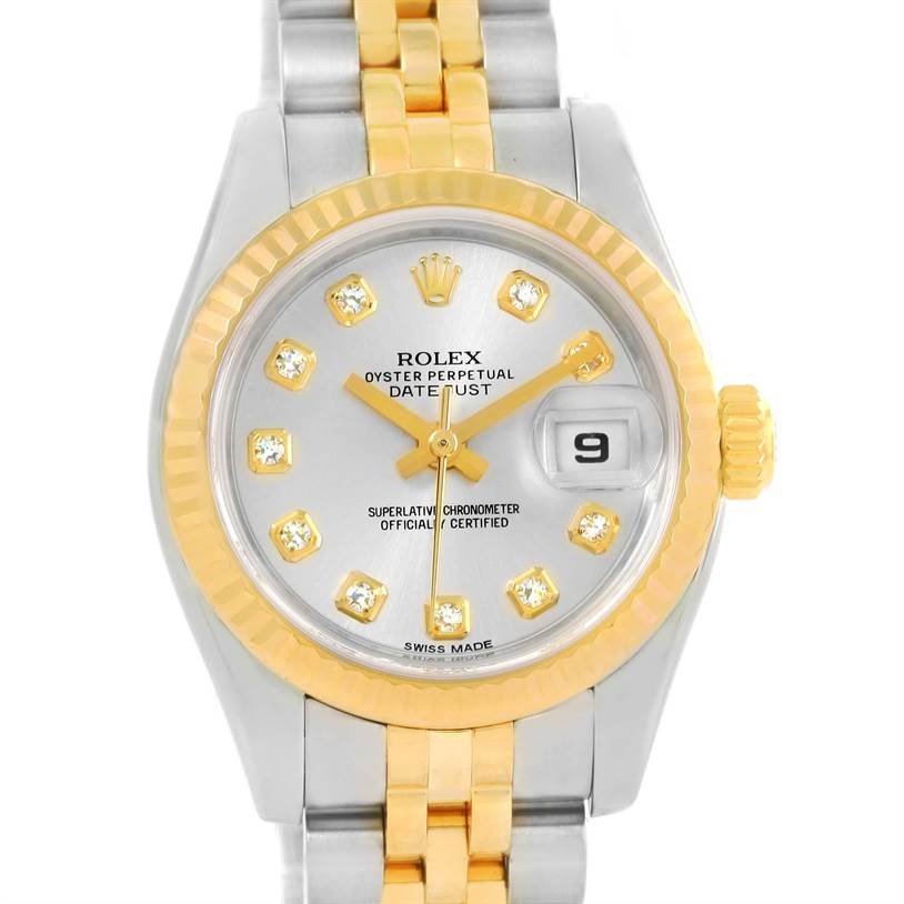 This image shows a full frontal view of a Rolex Datejust 179173 Women's Steel and Gold (two tone) Silver Dial 179173 Women's Steel and Gold (two tone) Silver Dial watch, highlighting its dial, bezel, hands, and part of the bracelet.
