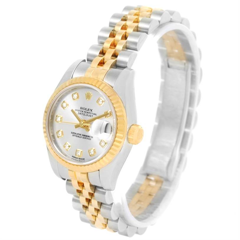 The Rolex Datejust 179173 Women's Steel and Gold (two tone) Silver Dial 179173 Women's Steel and Gold (two tone) Silver Dial watch is shown at an angle highlighting its face, bezel, crown, and bracelet.