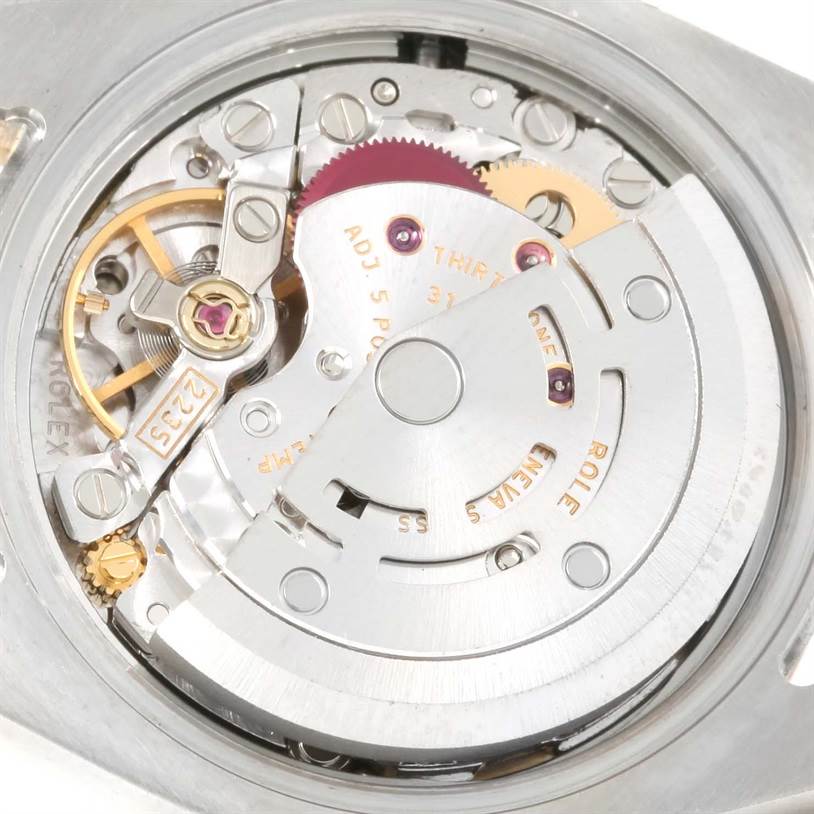 The image shows a close-up view of the movement and internal mechanisms of a Rolex Datejust 179173 Women's Steel and Gold (two tone) Mother of Pearl Dial 179173 Women's Steel and Gold (two tone) Mother of Pearl Dial watch.