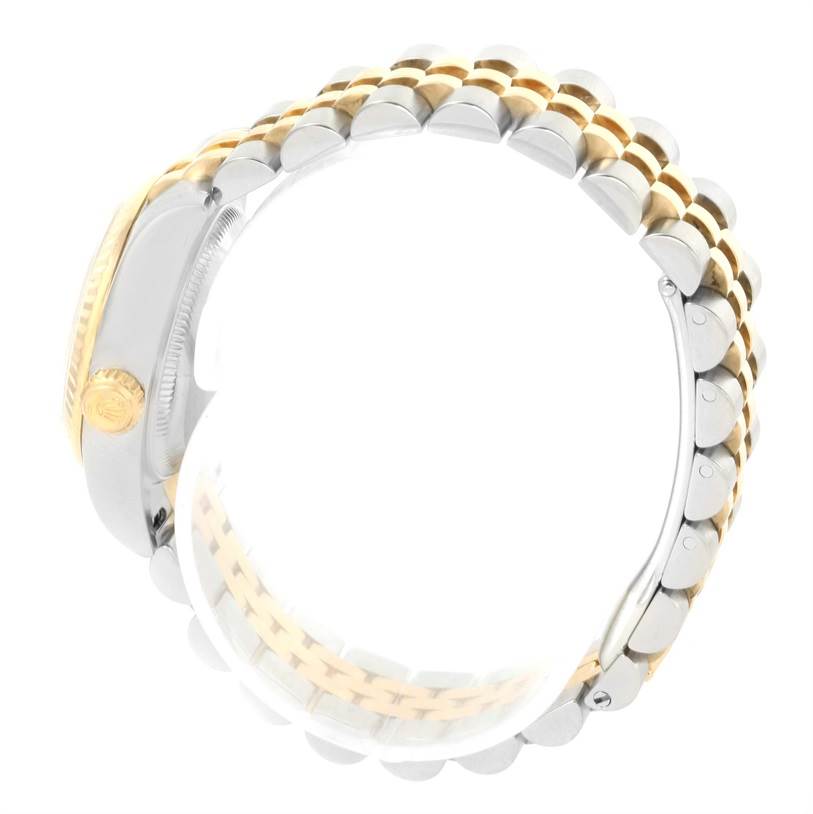 The image shows a side view of the bracelet and crown of the Rolex Datejust 179173 Women's Steel and Gold (two tone) Mother of Pearl Dial 179173 Women's Steel and Gold (two tone) Mother of Pearl Dial watch.