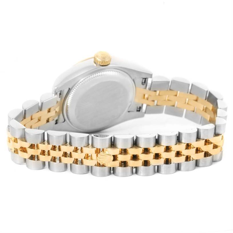 This image shows the back view of a Rolex Datejust 179173 Women's Steel and Gold (two tone) Mother of Pearl Dial 179173 Women's Steel and Gold (two tone) Mother of Pearl Dial, highlighting the caseback, crown, and two-tone metal bracelet.