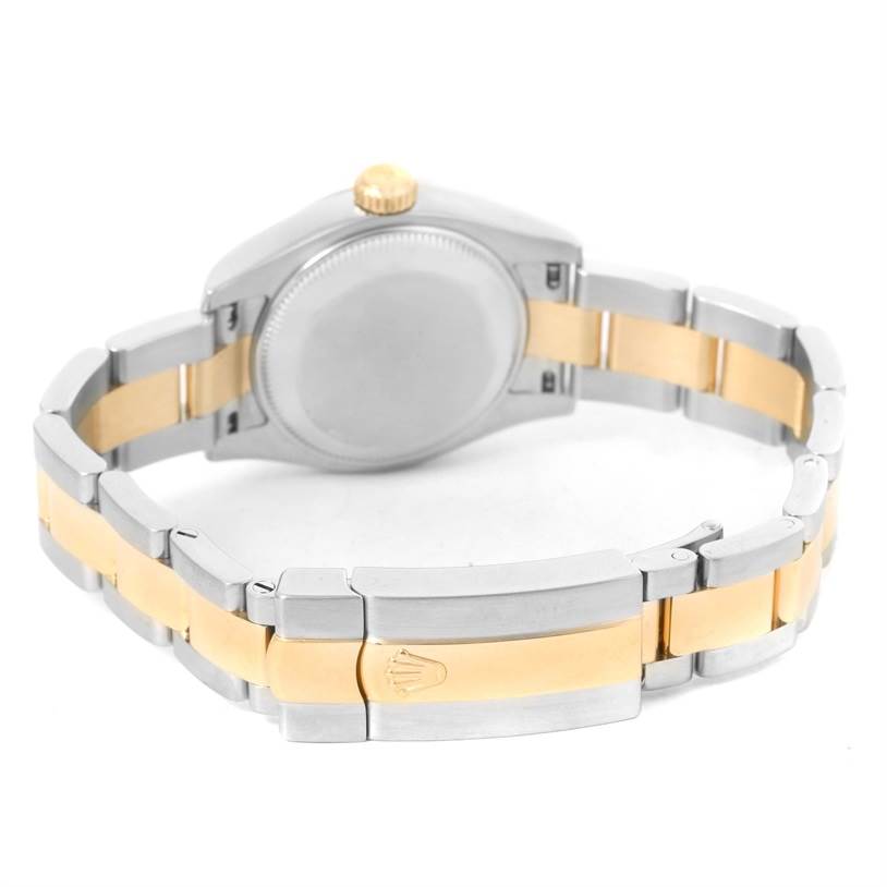 The image shows the back view of a Rolex Datejust 179173SDO Women's Steel and Gold (two tone) Silver Dial 179173SDO Women's Steel and Gold (two tone) Silver Dial watch, highlighting its two-tone bracelet and case back.