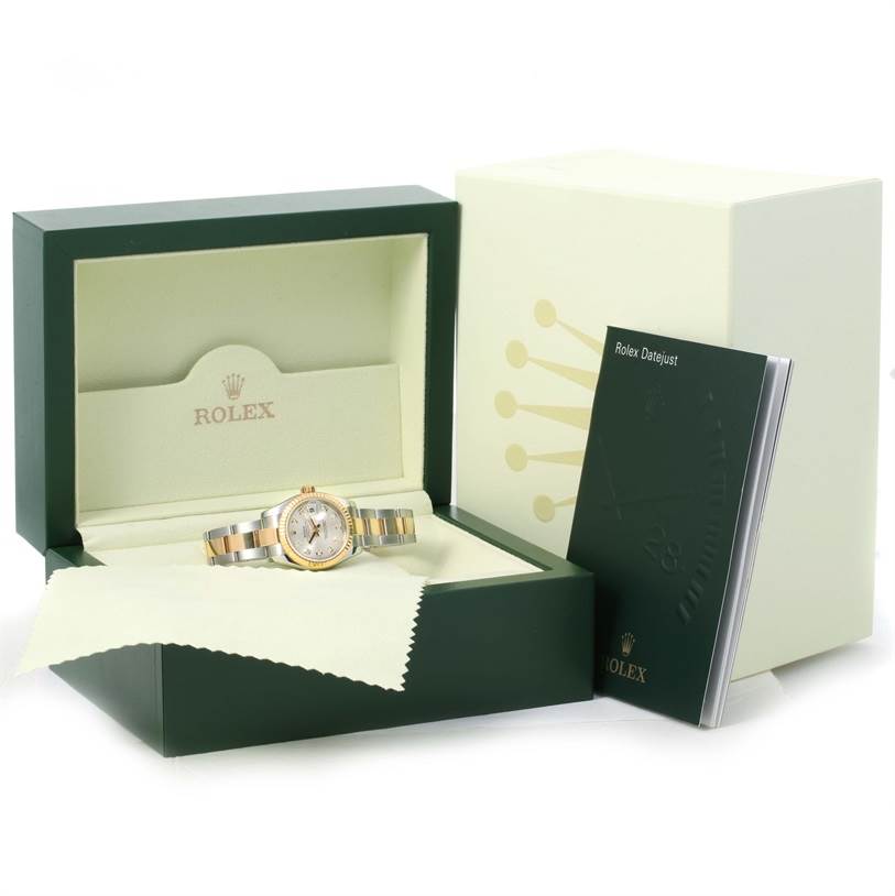 The image shows a Rolex Datejust 179173SDO Women's Steel and Gold (two tone) Silver Dial 179173SDO Women's Steel and Gold (two tone) Silver Dial watch in its open box, with the outer packaging and a booklet displayed to the side.