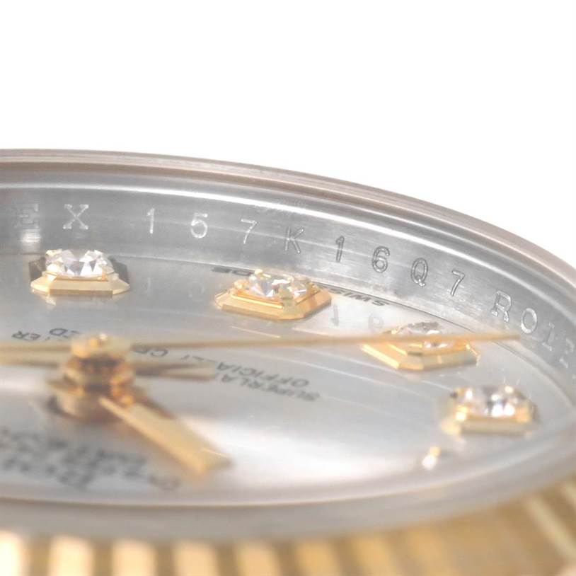 The image shows a close-up angled view of the Rolex Datejust 179173SDO Women's Steel and Gold (two tone) Silver Dial 179173SDO Women's Steel and Gold (two tone) Silver Dial watch's dial, with focus on the diamond hour markers and part of the inner bezel.