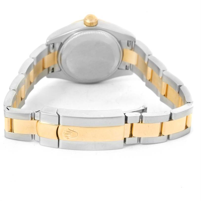 The image shows the back case and bracelet of a Rolex Datejust 179163 Women's Steel and Gold (two tone) Champagne Dial 179163 Women's Steel and Gold (two tone) Champagne Dial watch.