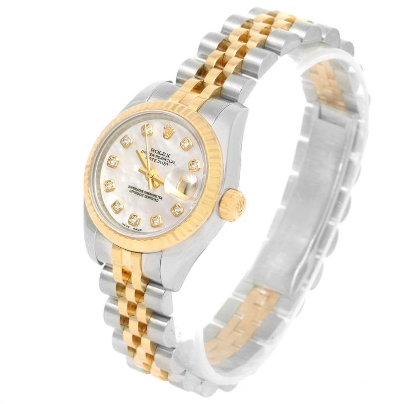 The image shows a Rolex Datejust 179173 Women's Steel and Gold (two tone) Mother of Pearl Dial 179173 Women's Steel and Gold (two tone) Mother of Pearl Dial model watch at a three-quarter angle, highlighting its dial, bezel, crown, and bracelet.