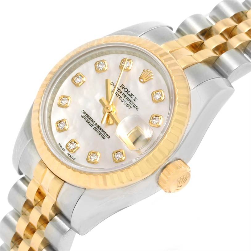 This Rolex Datejust 179173 Women's Steel and Gold (two tone) Mother of Pearl Dial 179173 Women's Steel and Gold (two tone) Mother of Pearl Dial watch is shown at an angled close-up, featuring the dial, bezel, crown, and part of the bracelet.