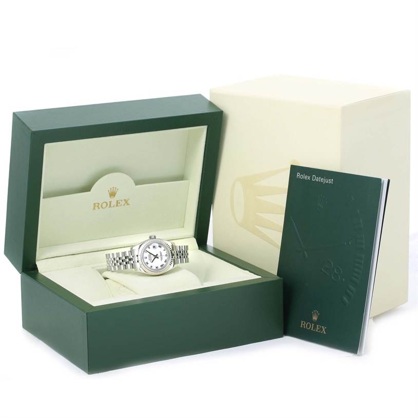 The image shows a Rolex Datejust 179174 Women's Stainless Steel White Dial 179174 Women's Stainless Steel White Dial watch with its packaging, including the watch case and instruction booklet, viewed from the front angle.