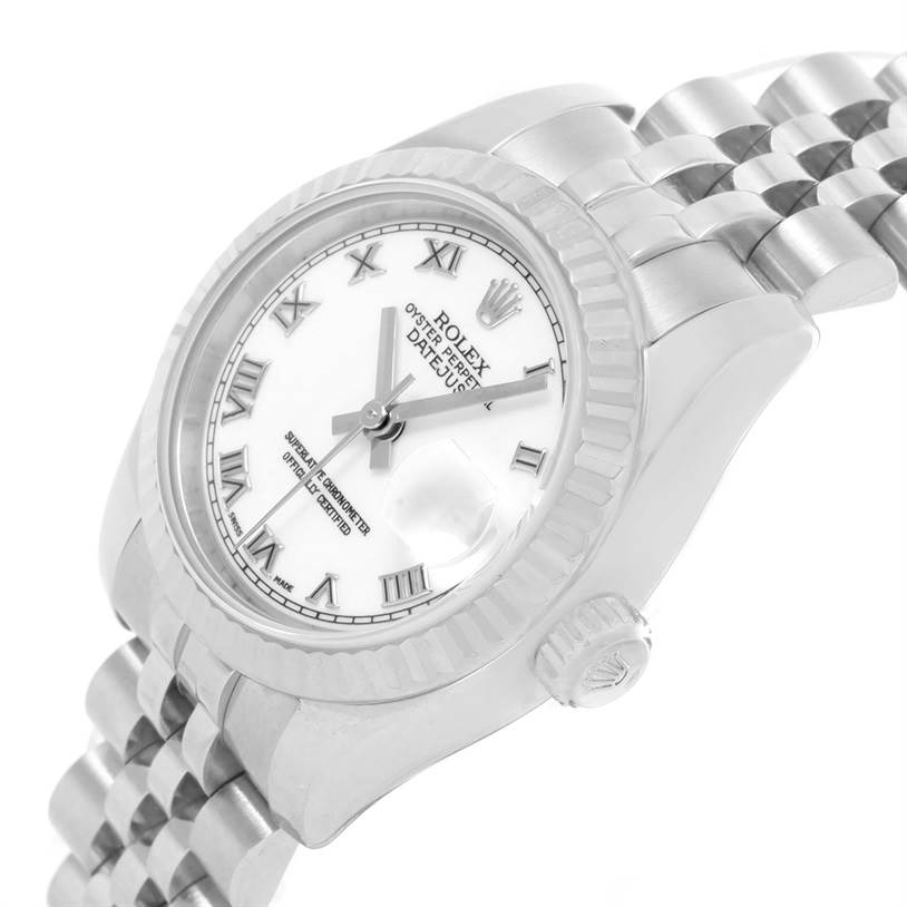 This image shows a side angle of a Rolex Datejust 179174 Women's Stainless Steel White Dial 179174 Women's Stainless Steel White Dial watch, highlighting the face, bezel, and part of the bracelet.