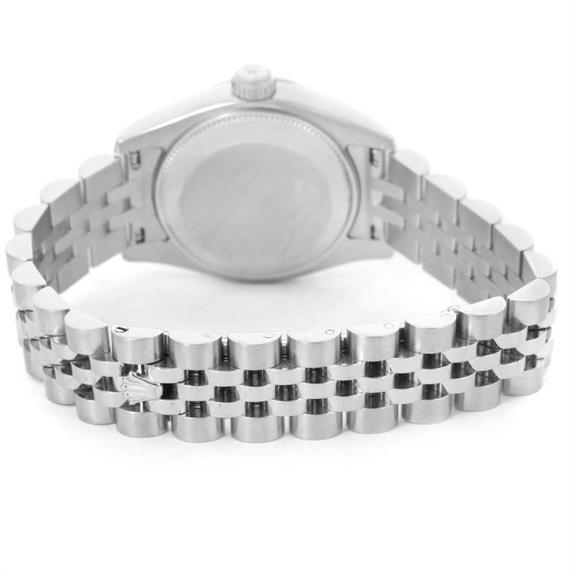 The image shows the back view of a Rolex Datejust 179174 Women's Stainless Steel White Dial 179174 Women's Stainless Steel White Dial watch, highlighting the case back and Jubilee bracelet.