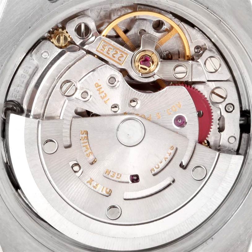 This image shows the intricate internal mechanism and movement of the Rolex Datejust 179174 Women's Stainless Steel White Dial 179174 Women's Stainless Steel White Dial watch from a close-up angle.
