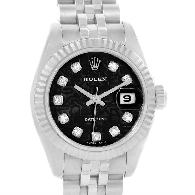 The image shows a frontal view of a Rolex Datejust 179174 Women
s Stainless Steel Black Dial 179174 Women
s Stainless Steel Black Dial watch, highlighting its black dial, date display, and stainless steel bracelet.