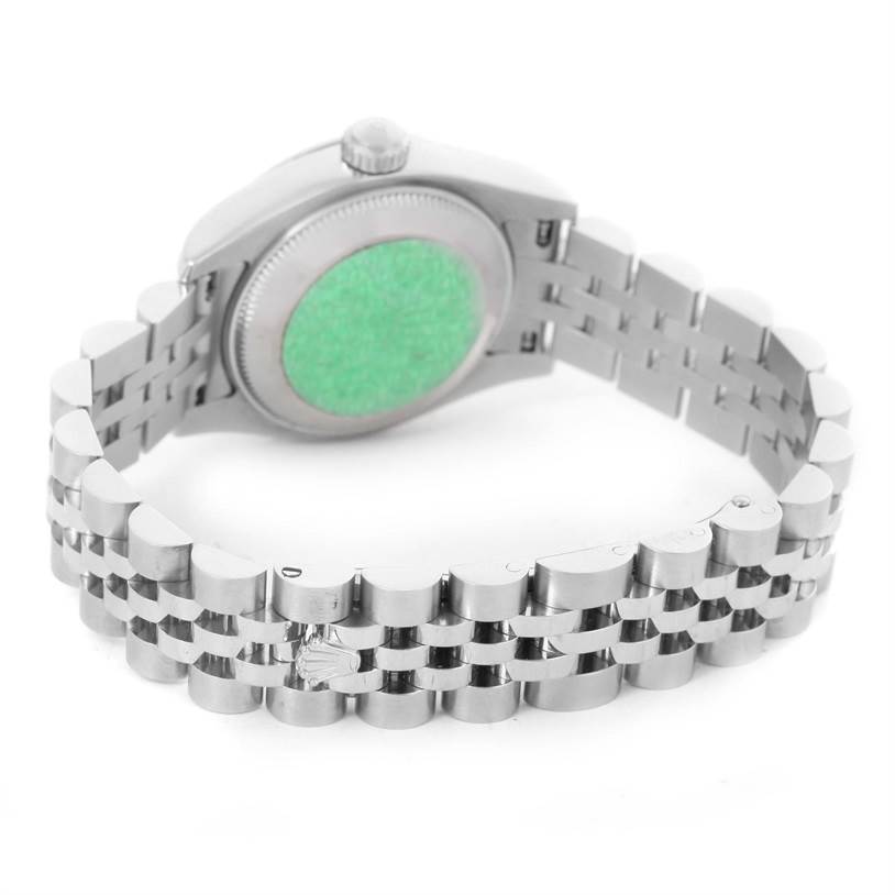 The image shows the back and bracelet of a Rolex Datejust 179174 Women
s Stainless Steel Black Dial 179174 Women
s Stainless Steel Black Dial watch, view is angled from the rear with a focus on the clasp and caseback.