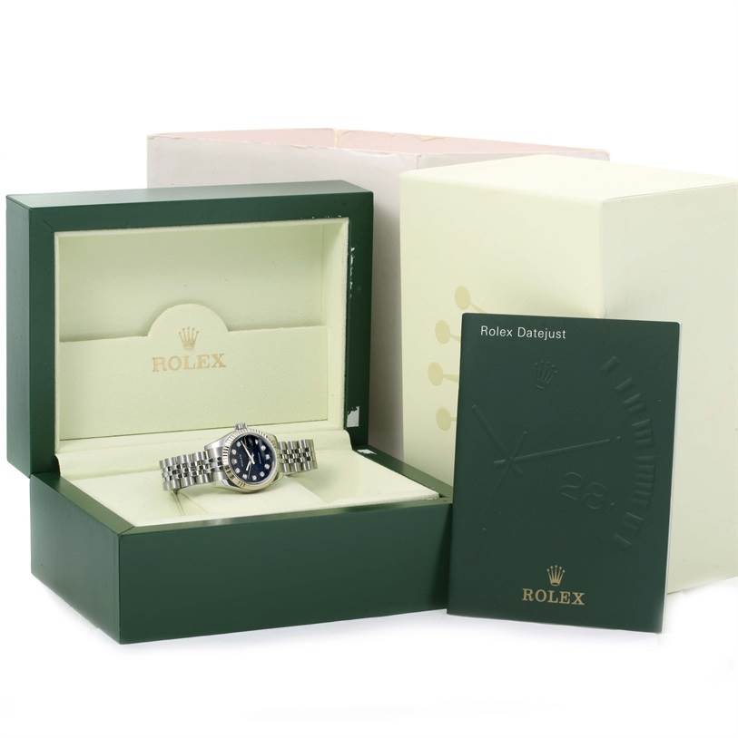 The image shows a Rolex Datejust 179174 Women
s Stainless Steel Black Dial 179174 Women
s Stainless Steel Black Dial watch inside its box, along with accompanying documentation.