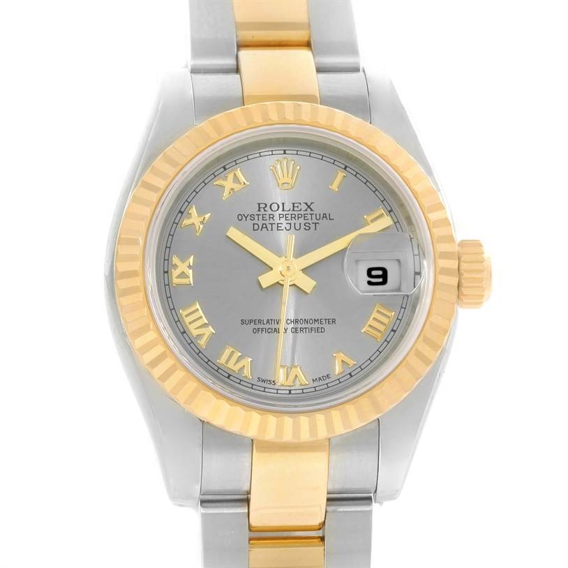 This Rolex Datejust 179173 Women's Steel and Gold (two tone) Silver Dial 179173 Women's Steel and Gold (two tone) Silver Dial watch is shown from the front, highlighting its gold fluted bezel, grey dial, and two-tone bracelet.