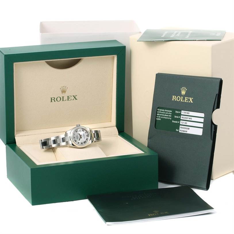 The Rolex Datejust 179160 Women's Stainless Steel Grey Dial 179160 Women's Stainless Steel Grey Dial watch is shown from the front in its green presentation box with accompanying documentation and booklet.