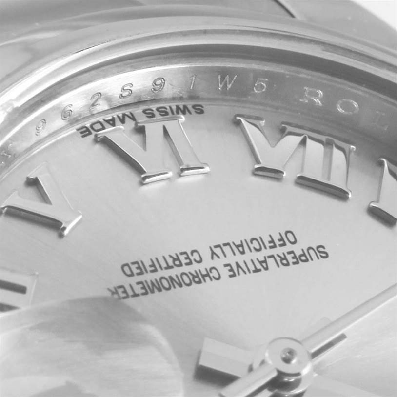 This is a close-up of a Rolex Datejust 179160 Women's Stainless Steel Grey Dial 179160 Women's Stainless Steel Grey Dial watch showing the dial, Roman numerals, and part of the bezel.