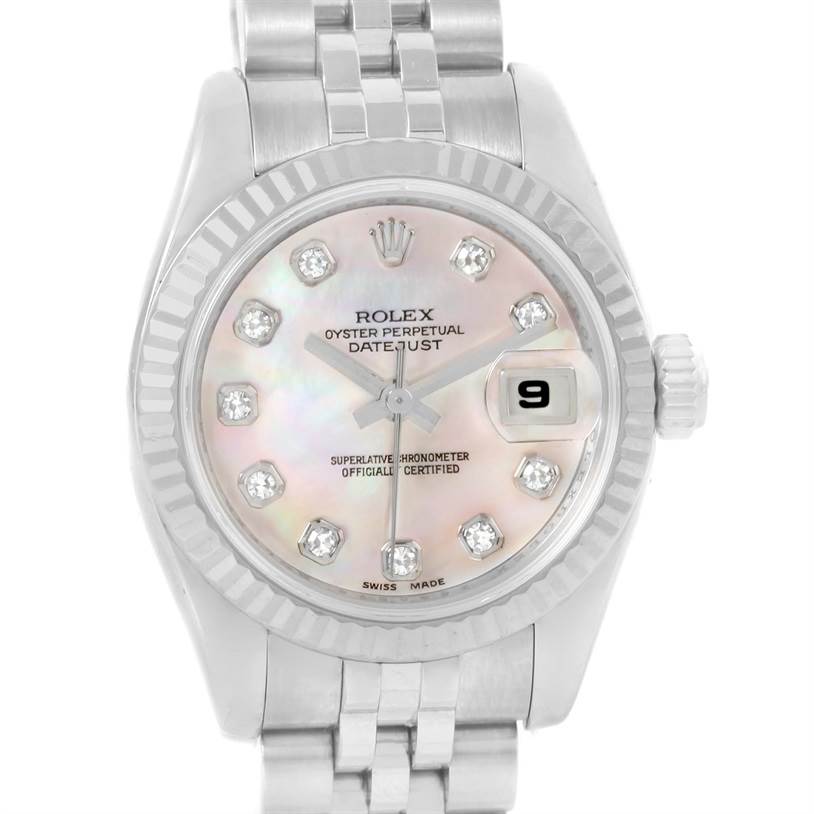 The image shows a close-up of a Rolex Datejust 179174 Women's Stainless Steel Mother of Pearl Dial 179174 Women's Stainless Steel Mother of Pearl Dial watch, highlighting the dial, bezel, bracelet, and crown.