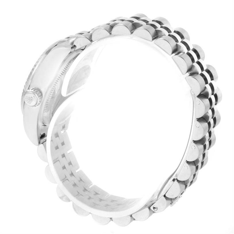 This image shows a side view of a Rolex Datejust 179174 Women's Stainless Steel Mother of Pearl Dial 179174 Women's Stainless Steel Mother of Pearl Dial model watch, highlighting the crown and bracelet.