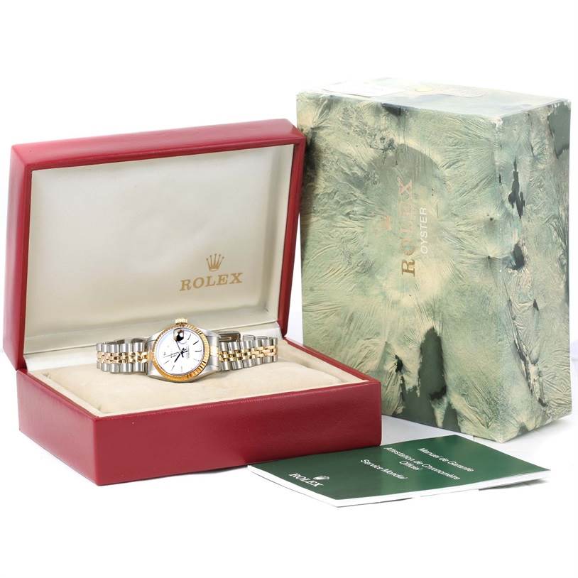 The image shows a Rolex Datejust 69173 Women
s Stainless Steel Silver Dial 69173 Women
s Stainless Steel Silver Dial watch displayed in an open red Rolex box with its packaging and accompanying booklets.