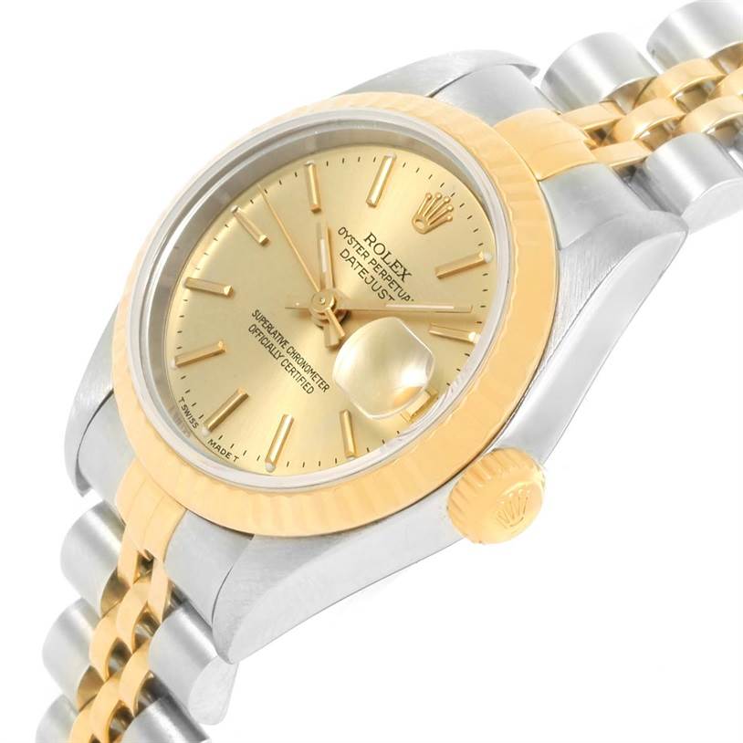 This image shows a Rolex Datejust 69173 Women
s Stainless Steel Champagne Dial 69173 Women
s Stainless Steel Champagne Dial watch at an angle highlighting its gold dial, fluted bezel, crown, and two-tone bracelet.