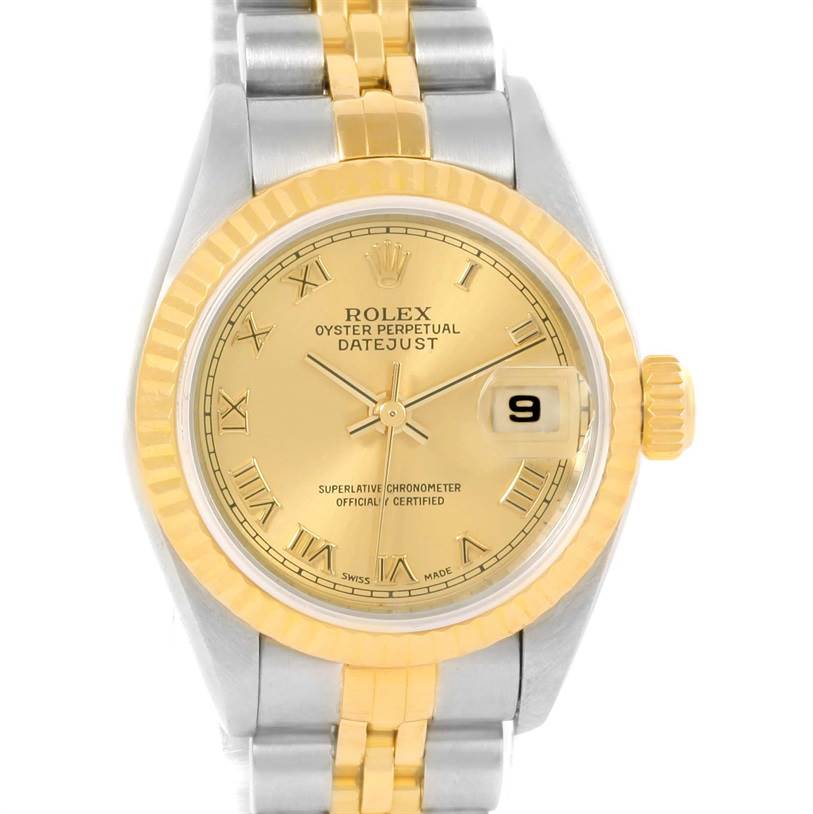 This image shows a Rolex Datejust 79173 Women
s Stainless Steel Champagne Dial 79173 Women
s Stainless Steel Champagne Dial watch from a front angle, highlighting the gold dial, date window, and two-tone bracelet.