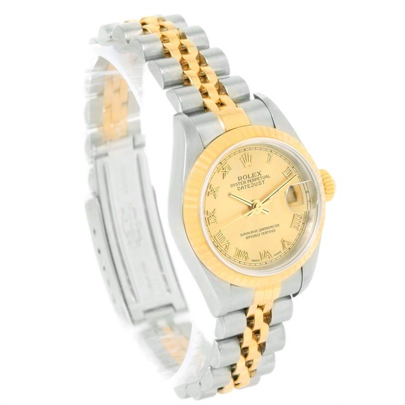 This image shows a Rolex Datejust 79173 Women
s Stainless Steel Champagne Dial 79173 Women
s Stainless Steel Champagne Dial watch from an angled side view, highlighting the bracelet, case, bezel, and dial.