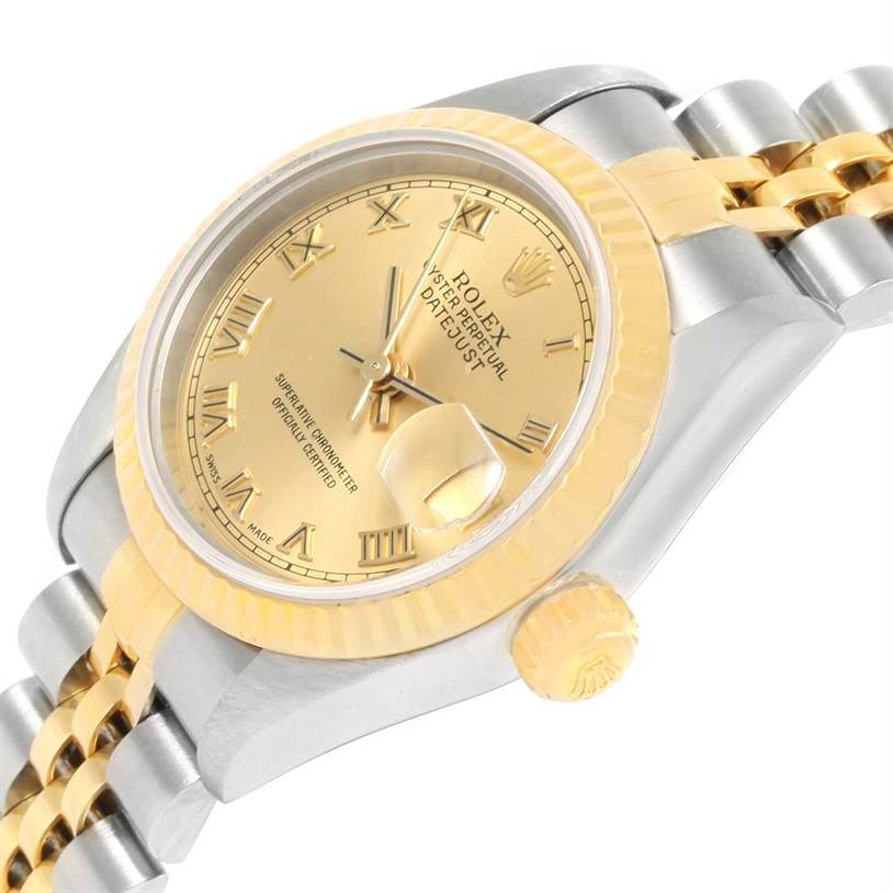 The image shows a close-up of a Rolex Datejust 79173 Women
s Stainless Steel Champagne Dial 79173 Women
s Stainless Steel Champagne Dial watch at an angle, highlighting the face, bezel, crown, and part of the bracelet.